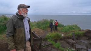 Lead archeologist Rick Knecht looks over the Nunalleq site